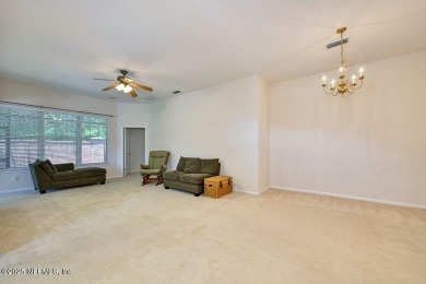 Welcome to easy, low-maintenance living in the heart of Fleming on Golf Club At Fleming Island in Florida - for sale on GolfHomes.com, golf home, golf lot