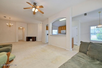 Welcome to easy, low-maintenance living in the heart of Fleming on Golf Club At Fleming Island in Florida - for sale on GolfHomes.com, golf home, golf lot