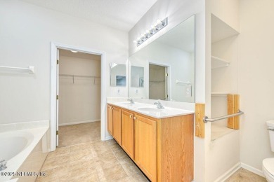 Welcome to easy, low-maintenance living in the heart of Fleming on Golf Club At Fleming Island in Florida - for sale on GolfHomes.com, golf home, golf lot