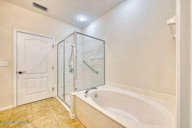 Welcome to easy, low-maintenance living in the heart of Fleming on Golf Club At Fleming Island in Florida - for sale on GolfHomes.com, golf home, golf lot