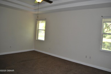 Welcome to this 4-bedroom home located in the highly desired on LPGA International Golf Course in Florida - for sale on GolfHomes.com, golf home, golf lot