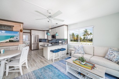 Live as though you're on a tranquil vacation every day in this on Key Colony Beach Golf Course in Florida - for sale on GolfHomes.com, golf home, golf lot