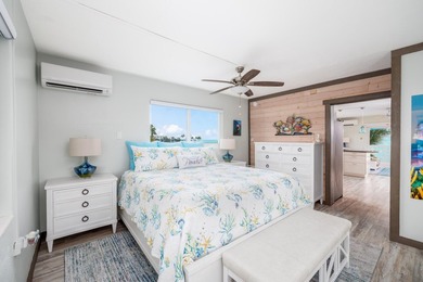 Live as though you're on a tranquil vacation every day in this on Key Colony Beach Golf Course in Florida - for sale on GolfHomes.com, golf home, golf lot