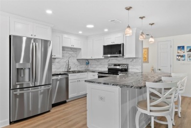 Welcome to your coastal dream home. This fully renovated on Gulf Harbors Golf Course in Florida - for sale on GolfHomes.com, golf home, golf lot