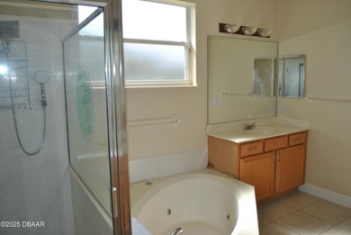 Welcome to this 4-bedroom home located in the highly desired on LPGA International Golf Course in Florida - for sale on GolfHomes.com, golf home, golf lot