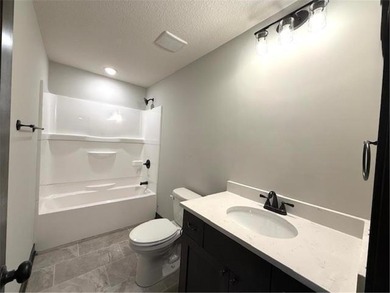 Former model home finally ready for a family to move in and on Inver Wood Golf Course in Minnesota - for sale on GolfHomes.com, golf home, golf lot