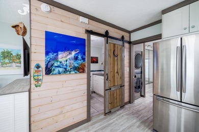 Live as though you're on a tranquil vacation every day in this on Key Colony Beach Golf Course in Florida - for sale on GolfHomes.com, golf home, golf lot