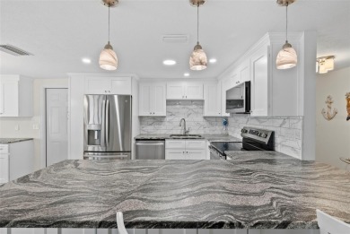 Welcome to your coastal dream home. This fully renovated on Gulf Harbors Golf Course in Florida - for sale on GolfHomes.com, golf home, golf lot