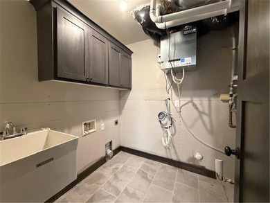 Former model home finally ready for a family to move in and on Inver Wood Golf Course in Minnesota - for sale on GolfHomes.com, golf home, golf lot