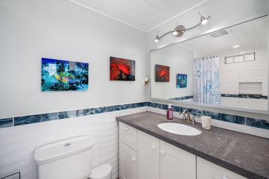 Live as though you're on a tranquil vacation every day in this on Key Colony Beach Golf Course in Florida - for sale on GolfHomes.com, golf home, golf lot