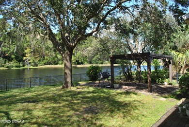 Welcome to this 4-bedroom home located in the highly desired on LPGA International Golf Course in Florida - for sale on GolfHomes.com, golf home, golf lot