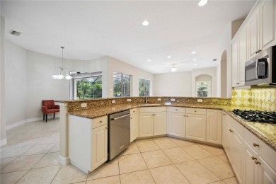 Absolutely stunning and move-in ready! This 4 bedroom, 3 on Venetian Golf and River Club in Florida - for sale on GolfHomes.com, golf home, golf lot