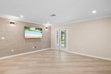 Rarely available 3-bed, 2-bath home near prestigious Vero Beach on Vero Beach Country Club in Florida - for sale on GolfHomes.com, golf home, golf lot