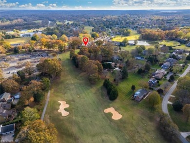 Discover this lovely home overlooking the 9th hole at BRCC. This on Bermuda Run Country Club in North Carolina - for sale on GolfHomes.com, golf home, golf lot