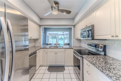 When you step through the double-door entry, you'll immediately on Timber Pines Golf Course in Florida - for sale on GolfHomes.com, golf home, golf lot