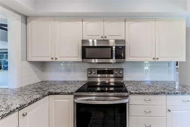 When you step through the double-door entry, you'll immediately on Timber Pines Golf Course in Florida - for sale on GolfHomes.com, golf home, golf lot