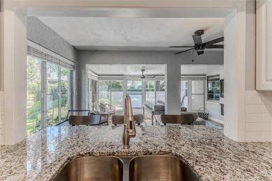 When you step through the double-door entry, you'll immediately on Timber Pines Golf Course in Florida - for sale on GolfHomes.com, golf home, golf lot