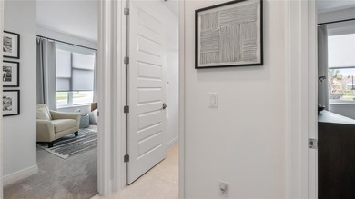 Discover exclusive living in this luxury townhome nestled within on Eagle Creek Golf Club in Florida - for sale on GolfHomes.com, golf home, golf lot