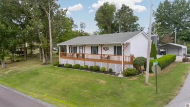 Welcome to this dreamy home, reminiscent of a Better Homes on Kentucky Dam Village State Resort Park Golf Course in Kentucky - for sale on GolfHomes.com, golf home, golf lot