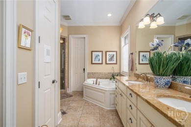 Delight in the exceptional curb appeal of this spacious patio on The Landings Club - Palmetto in Georgia - for sale on GolfHomes.com, golf home, golf lot