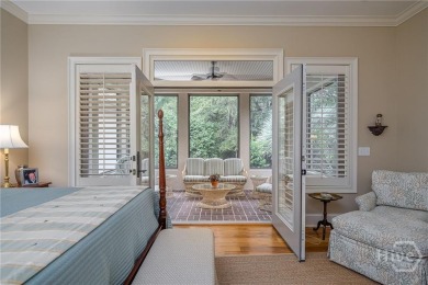 Delight in the exceptional curb appeal of this spacious patio on The Landings Club - Palmetto in Georgia - for sale on GolfHomes.com, golf home, golf lot
