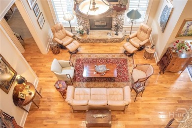 Delight in the exceptional curb appeal of this spacious patio on The Landings Club - Palmetto in Georgia - for sale on GolfHomes.com, golf home, golf lot