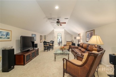 Delight in the exceptional curb appeal of this spacious patio on The Landings Club - Palmetto in Georgia - for sale on GolfHomes.com, golf home, golf lot
