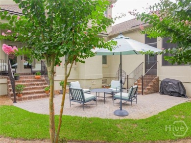 Delight in the exceptional curb appeal of this spacious patio on The Landings Club - Palmetto in Georgia - for sale on GolfHomes.com, golf home, golf lot