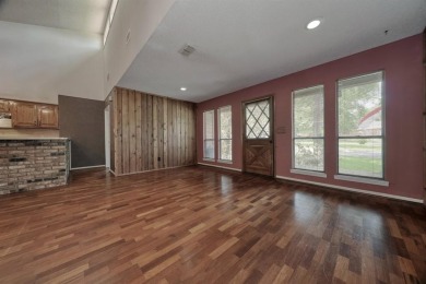 Step inside this charming single-story cottage and discover the on Hide-A-Way Lake Golf Course in Texas - for sale on GolfHomes.com, golf home, golf lot