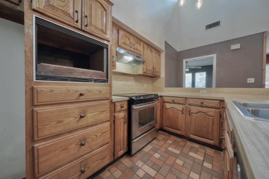 Step inside this charming single-story cottage and discover the on Hide-A-Way Lake Golf Course in Texas - for sale on GolfHomes.com, golf home, golf lot