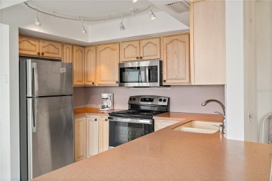 Discover Resort-Style Living in Isla del Sol - Stunning on Isla Del Sol Yacht and Country Club in Florida - for sale on GolfHomes.com, golf home, golf lot