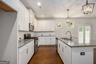 Experience golf course living at its finest in this spacious on Mirror Lake Golf Club in Georgia - for sale on GolfHomes.com, golf home, golf lot
