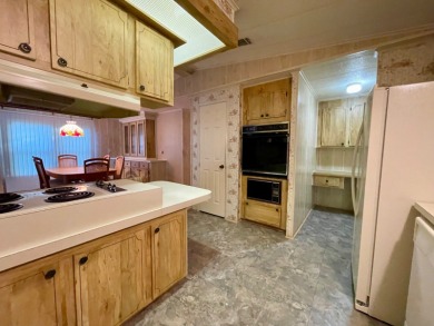 A furnished and well maintained 2bed/2bath home in the 55+ on Rolling Greens Executive Golf Community in Florida - for sale on GolfHomes.com, golf home, golf lot