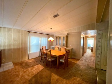 A furnished and well maintained 2bed/2bath home in the 55+ on Rolling Greens Executive Golf Community in Florida - for sale on GolfHomes.com, golf home, golf lot
