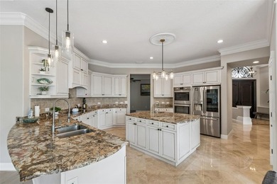 Welcome to your dream home! This stunning, custom-built luxury on Fox Hollow Golf Club in Florida - for sale on GolfHomes.com, golf home, golf lot