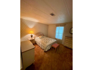 A furnished and well maintained 2bed/2bath home in the 55+ on Rolling Greens Executive Golf Community in Florida - for sale on GolfHomes.com, golf home, golf lot
