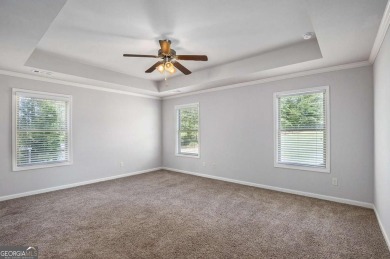 Experience golf course living at its finest in this spacious on Mirror Lake Golf Club in Georgia - for sale on GolfHomes.com, golf home, golf lot