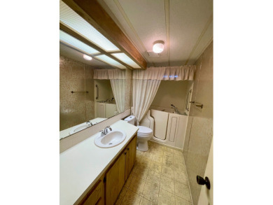 A furnished and well maintained 2bed/2bath home in the 55+ on Rolling Greens Executive Golf Community in Florida - for sale on GolfHomes.com, golf home, golf lot