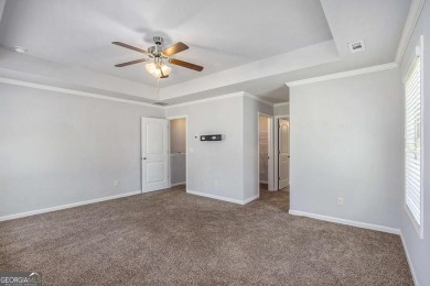 Experience golf course living at its finest in this spacious on Mirror Lake Golf Club in Georgia - for sale on GolfHomes.com, golf home, golf lot