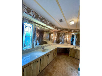 A furnished and well maintained 2bed/2bath home in the 55+ on Rolling Greens Executive Golf Community in Florida - for sale on GolfHomes.com, golf home, golf lot
