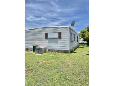 Whether you're investing or trying to secure a piece of sunshine on Barefoot Bay Golf Course in Florida - for sale on GolfHomes.com, golf home, golf lot