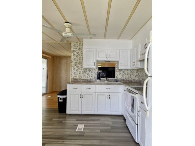 Whether you're investing or trying to secure a piece of sunshine on Barefoot Bay Golf Course in Florida - for sale on GolfHomes.com, golf home, golf lot