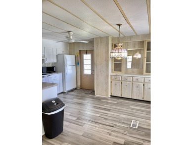 Whether you're investing or trying to secure a piece of sunshine on Barefoot Bay Golf Course in Florida - for sale on GolfHomes.com, golf home, golf lot