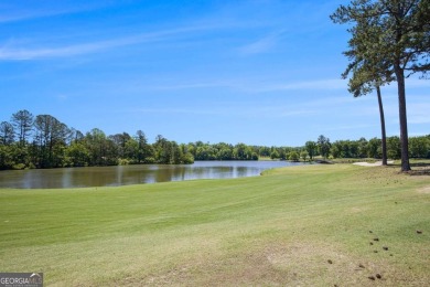 Experience golf course living at its finest in this spacious on Mirror Lake Golf Club in Georgia - for sale on GolfHomes.com, golf home, golf lot
