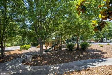 Experience golf course living at its finest in this spacious on Mirror Lake Golf Club in Georgia - for sale on GolfHomes.com, golf home, golf lot