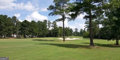 Experience golf course living at its finest in this spacious on Mirror Lake Golf Club in Georgia - for sale on GolfHomes.com, golf home, golf lot