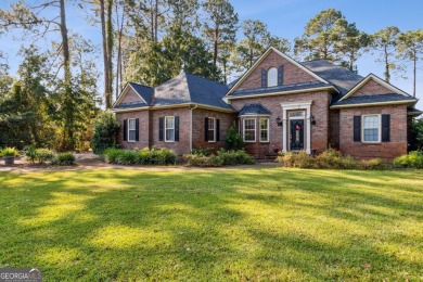 Discover your dream home nestled alongside the stunning 8th hole on The Club At Osprey Cove in Georgia - for sale on GolfHomes.com, golf home, golf lot