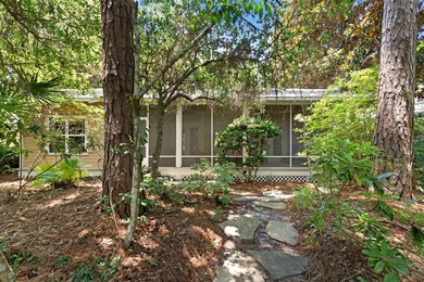 Southern coastal design and decor define this lakefront cottage on Sandestin Golf and Beach Resort - Raven in Florida - for sale on GolfHomes.com, golf home, golf lot