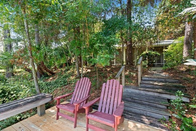 Southern coastal design and decor define this lakefront cottage on Sandestin Golf and Beach Resort - Raven in Florida - for sale on GolfHomes.com, golf home, golf lot