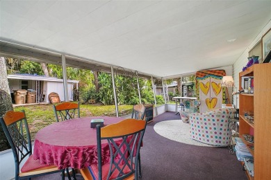 Nestled in the highly sought-after 55+ community of IMPERIAL on Bay Tree Golf Course in Florida - for sale on GolfHomes.com, golf home, golf lot